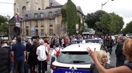 Crowds gather outside church to say farewell to French comedian Guy Bedos
