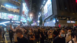 Hongkongers flood streets before heading to Tiananmen Square vigil