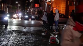 Chaotic scenes in SoHo area of NYC as looters nearly run over pedestrians