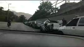 Venezuelans queue for miles at gas station as Iran says ready to ship more fuel