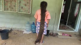 Superstitious Thai woman has 5ft long dreadlocked hair after leaving it unwashed for 20 years