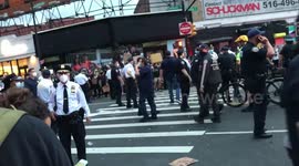 African-American Protestor yells