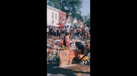 Little white boy pumps fist with black man at George Floyd's memorial in Minneapolis