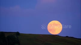 Beautiful Strawberry Full Moon Time-Lapse over Alport Heights near Wirksworth Derbyshire 5th June 2020
