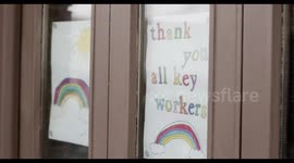 COVID-19 Signage, Rainbow drawing from child and thanking key workers at Small Business during Corona pandemic, Life after lockdown new normal