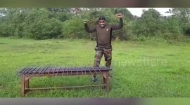 Man sets world record by bending 24 iron rods with his head in one minute in northeastern India
