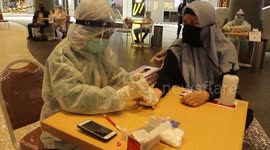 Mall employees in Makassar, Indonesia get tested for COVID-19 before mall reopens