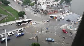 Motorcyclist swept away by rushing waters during flash flood and extreme weather