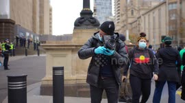 Man takes photo at Black Lives Matter protest, Melbourne