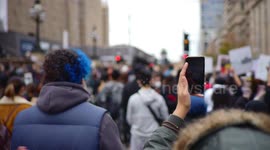 Woman livestreams Black Lives Matter protest outside Parliament House, Melbourne