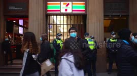 Police stand outside 7-Eleven during BLM protest, Melbourne
