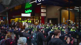 BLM protestors hold their hands up to police, Melbourne