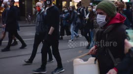 BLM protestor plays drums, Melbourne