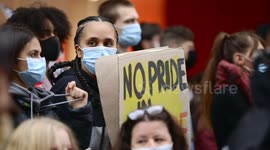 Young BLM protestor holds sign, Melbourne