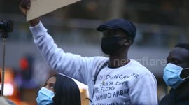 BLM protestor raises fist, Melbourne