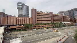 The view of the Hong Kong Polytechnic University and the Cross-Habour Tunnel during the university siege