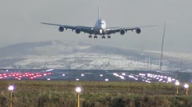 Emirates A380 makes perfect landing against snowy Pennines backdrop
