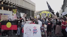 Black Lives Matter protesters block police convoy in Brisbane, Australia