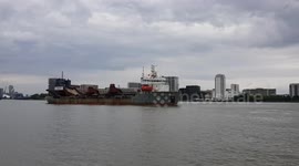 Ship Passing Through The Thames Barrier on the thames
