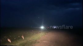 Watch as South Dakota storm chasers capture 70 mph winds and lightning as severe storms cross northern plains