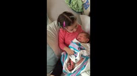 Little girl promises “we can always fix this” to crying newborn brother