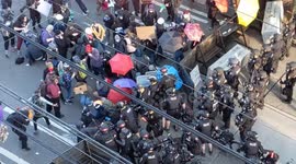 Clashes as police surround Black Lives Matter protesters in Seattle before forcing them to move using flashbang grenades and pepper spray