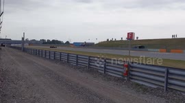 Passing race car near track