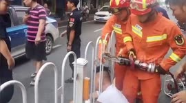 Firefighters free Chinese man's head from guardrails