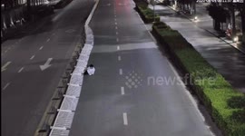 Road guardrails fall like dominos after drunk man jumps over them and falls down