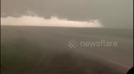 Watch as storm chaser punches through hail core in South Dakota