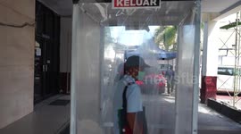 Vehicle tax service reopens after lockdown restrictions eased in Indonesia