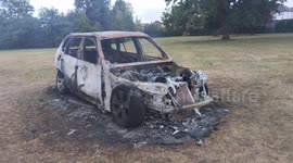 Burnt BMW car in Woodcock Park