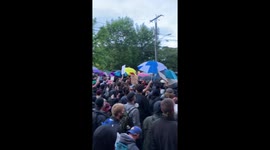 Black Lives Matter protesters attempt to push back police line in Seattle