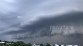 Imposing grey Arcus clouds tower in Thailand before tropical storm hits