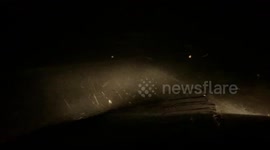 Watch as storm chaser bombarded by barrage of hail in Nebraska