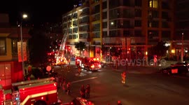 Firefighters seen responding to apartment fire in San Diego