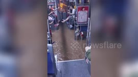 Vehicles and buses submerged as strong rainstorm brings flash floods to southern Chinese city