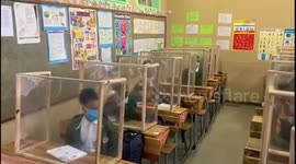 Cape Town school puts up plastic screens on students' desks to protect them from coronavirus