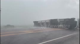 Crashed Semi flipped on its side blocks South Dakota Interstate