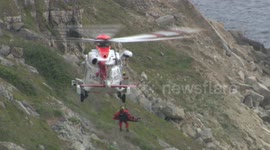 Dramatic images of injured climber rescued by helicopter in Dorset
