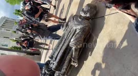 Minnesota crowd celebrates toppling Christopher Columbus statue