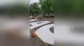 Inside Seattle’s ‘Autonomous Zone’ there's a huge sign on the road that simply reads, 'Black Lives Matter'