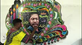 Watch - More video - In solidarity and tribute a Pakistani truck artist paints George Floyd's Mural