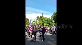 Black Lives Matter marchers rally throughout Seattle towards capitol as Trump demands city be taken back