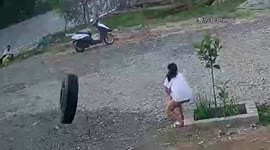 Runaway tyre knocks over pedestrians on roadside after falling from truck in China