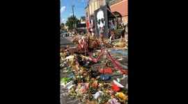 Flowers and murals adorn memorial built for George Floyd in Minneapolis