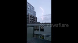 Dramatic slow motion footage shows lightning strike Canada's CN Tower