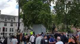 Police clash with far-right protesters in Parliament Square close to boarded up statues