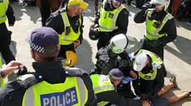 A protester is treated by police Medics after being attacked by other protesters and a black lives matter demonstration in central London warning graphic content