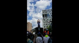 Activist waves Black Lives Matter flag in Minneapolis